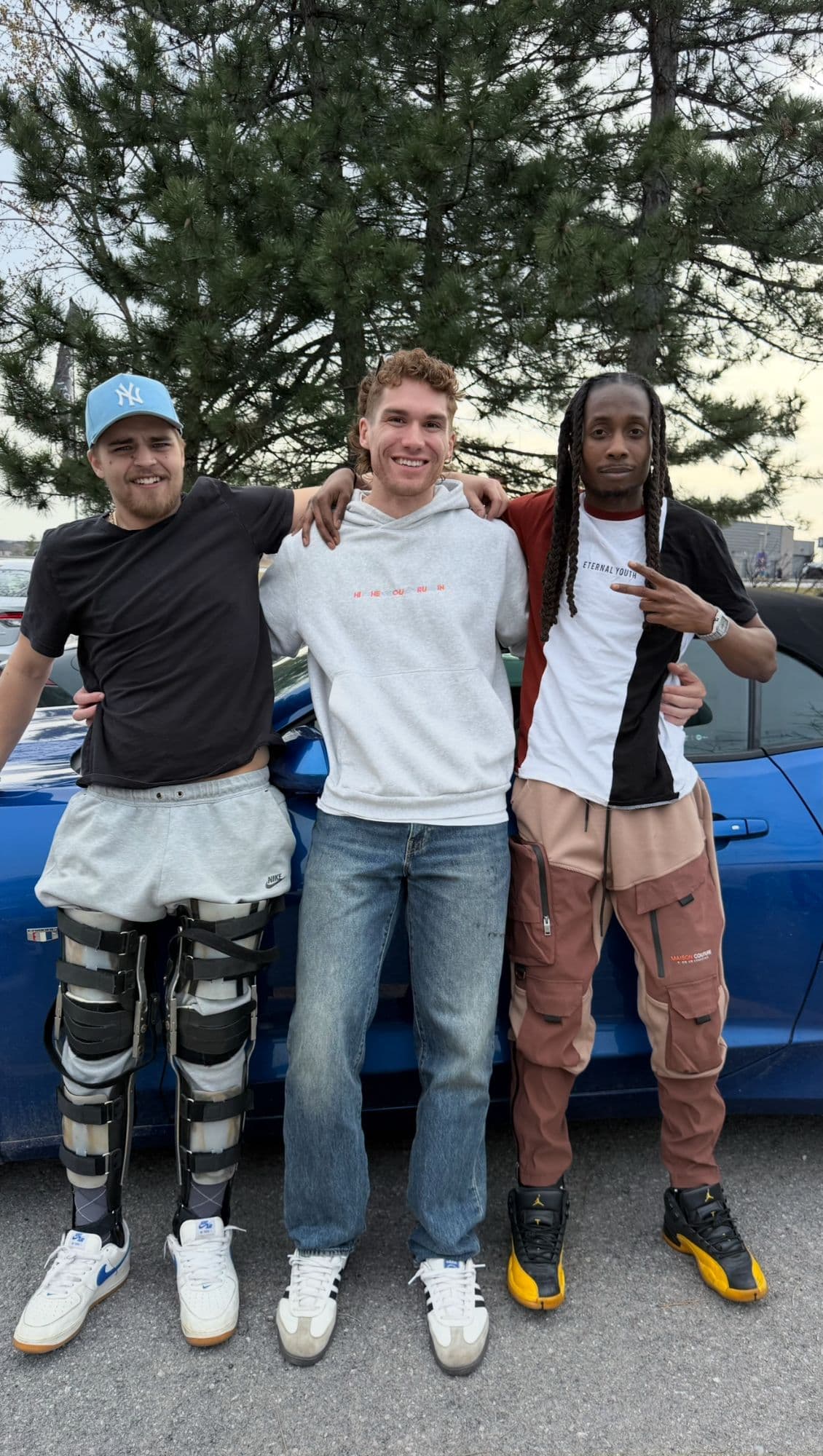 HTGR survivors Ethan, Brandon, and Michael together — three young men who refused to let trauma define them